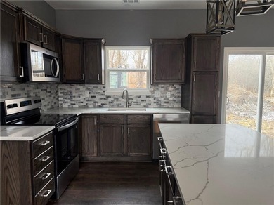 New Construction Lake Cottage in Linn Valley Lakes. Perfect cozy on Linn Valley Lakes - Deer Trace Golf Course in Kansas - for sale on GolfHomes.com, golf home, golf lot