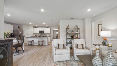 Welcome to the Freeport Plan, a new home floor plan at Sunny on Sunny Hills Golf and Country Club in Florida - for sale on GolfHomes.com, golf home, golf lot