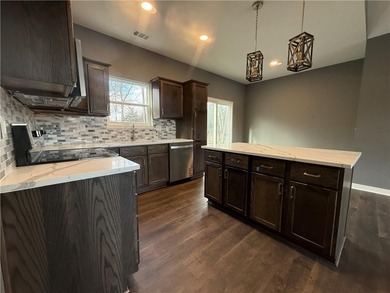 New Construction Lake Cottage in Linn Valley Lakes. Perfect cozy on Linn Valley Lakes - Deer Trace Golf Course in Kansas - for sale on GolfHomes.com, golf home, golf lot