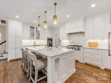 Stunning updated 2 story brick home located in the highly on Carmel Country Club in North Carolina - for sale on GolfHomes.com, golf home, golf lot