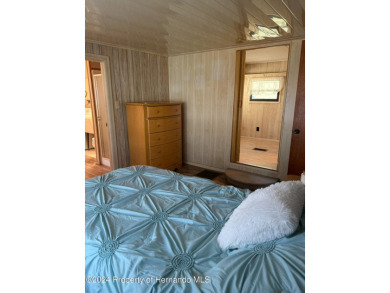 NO LOT RENT, it is a deeded lot, 2 bedrooms 1-1/2 Baths on Tooke on Glen Lakes Country Club in Florida - for sale on GolfHomes.com, golf home, golf lot