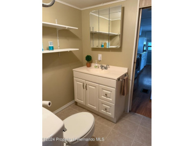 NO LOT RENT, it is a deeded lot, 2 bedrooms 1-1/2 Baths on Tooke on Glen Lakes Country Club in Florida - for sale on GolfHomes.com, golf home, golf lot
