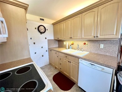 LOCATION! LOCATION!! DIRECTLY AROSS FROM THE CLUBHOUSE! COME AND on Hillsboro Pines Golf in Florida - for sale on GolfHomes.com, golf home, golf lot