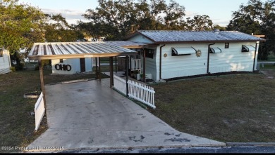 NO LOT RENT, it is a deeded lot, 2 bedrooms 1-1/2 Baths on Tooke on Glen Lakes Country Club in Florida - for sale on GolfHomes.com, golf home, golf lot