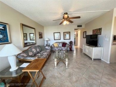 LOCATION! LOCATION!! DIRECTLY AROSS FROM THE CLUBHOUSE! COME AND on Hillsboro Pines Golf in Florida - for sale on GolfHomes.com, golf home, golf lot