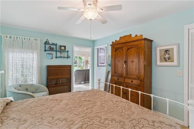 This South-end bungalow offers beautiful views of Lake Worth in on Sea Island Golf Club in Georgia - for sale on GolfHomes.com, golf home, golf lot