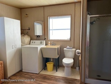 NO LOT RENT, it is a deeded lot, 2 bedrooms 1-1/2 Baths on Tooke on Glen Lakes Country Club in Florida - for sale on GolfHomes.com, golf home, golf lot