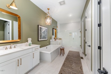 This stunning Braxton floorplan--one of the most sought-after on Hasentree Club in North Carolina - for sale on GolfHomes.com, golf home, golf lot
