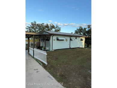NO LOT RENT, it is a deeded lot, 2 bedrooms 1-1/2 Baths on Tooke on Glen Lakes Country Club in Florida - for sale on GolfHomes.com, golf home, golf lot