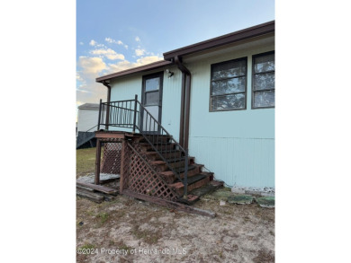 NO LOT RENT, it is a deeded lot, 2 bedrooms 1-1/2 Baths on Tooke on Glen Lakes Country Club in Florida - for sale on GolfHomes.com, golf home, golf lot