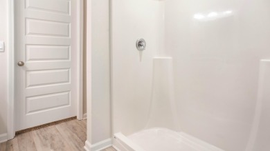Welcome to the Freeport Plan, a new home floor plan at Sunny on Sunny Hills Golf and Country Club in Florida - for sale on GolfHomes.com, golf home, golf lot
