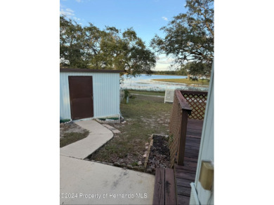 NO LOT RENT, it is a deeded lot, 2 bedrooms 1-1/2 Baths on Tooke on Glen Lakes Country Club in Florida - for sale on GolfHomes.com, golf home, golf lot