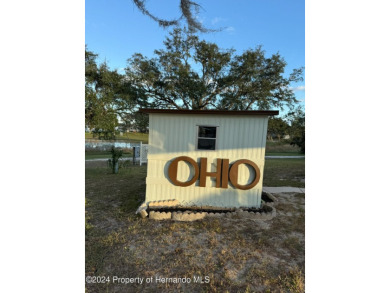 NO LOT RENT, it is a deeded lot, 2 bedrooms 1-1/2 Baths on Tooke on Glen Lakes Country Club in Florida - for sale on GolfHomes.com, golf home, golf lot