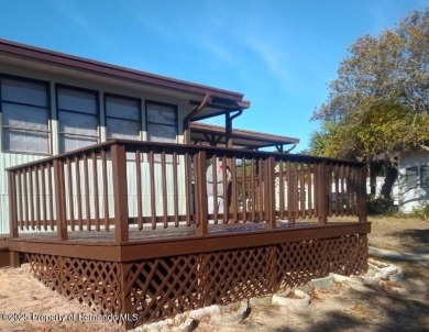 NO LOT RENT, it is a deeded lot, 2 bedrooms 1-1/2 Baths on Tooke on Glen Lakes Country Club in Florida - for sale on GolfHomes.com, golf home, golf lot