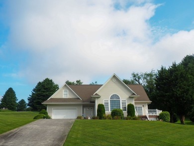 This exceptional home overlooks the 14th hole and beautiful lake on The Clubs of Olde Mill in Virginia - for sale on GolfHomes.com, golf home, golf lot