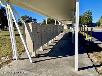 NO LOT RENT, it is a deeded lot, 2 bedrooms 1-1/2 Baths on Tooke on Glen Lakes Country Club in Florida - for sale on GolfHomes.com, golf home, golf lot