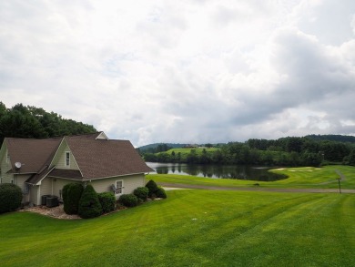 This exceptional home overlooks the 14th hole and beautiful lake on The Clubs of Olde Mill in Virginia - for sale on GolfHomes.com, golf home, golf lot