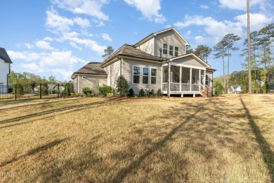 This stunning Braxton floorplan--one of the most sought-after on Hasentree Club in North Carolina - for sale on GolfHomes.com, golf home, golf lot