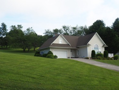 This exceptional home overlooks the 14th hole and beautiful lake on The Clubs of Olde Mill in Virginia - for sale on GolfHomes.com, golf home, golf lot
