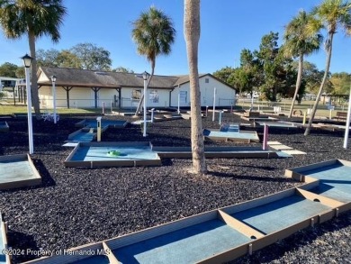 NO LOT RENT, it is a deeded lot, 2 bedrooms 1-1/2 Baths on Tooke on Glen Lakes Country Club in Florida - for sale on GolfHomes.com, golf home, golf lot