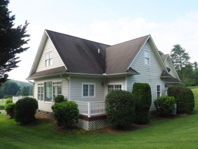 This exceptional home overlooks the 14th hole and beautiful lake on The Clubs of Olde Mill in Virginia - for sale on GolfHomes.com, golf home, golf lot