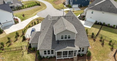 This stunning Braxton floorplan--one of the most sought-after on Hasentree Club in North Carolina - for sale on GolfHomes.com, golf home, golf lot
