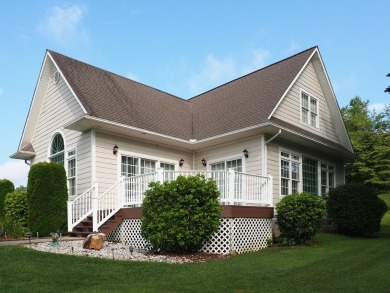 This exceptional home overlooks the 14th hole and beautiful lake on The Clubs of Olde Mill in Virginia - for sale on GolfHomes.com, golf home, golf lot
