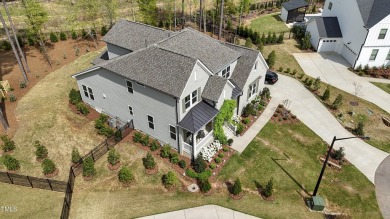 This stunning Braxton floorplan--one of the most sought-after on Hasentree Club in North Carolina - for sale on GolfHomes.com, golf home, golf lot