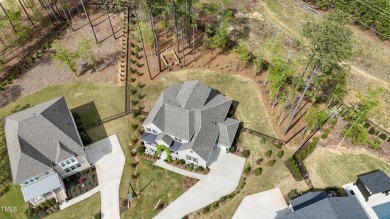 This stunning Braxton floorplan--one of the most sought-after on Hasentree Club in North Carolina - for sale on GolfHomes.com, golf home, golf lot