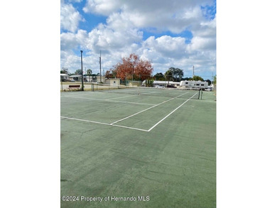 NO LOT RENT, it is a deeded lot, 2 bedrooms 1-1/2 Baths on Tooke on Glen Lakes Country Club in Florida - for sale on GolfHomes.com, golf home, golf lot