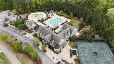 This stunning Braxton floorplan--one of the most sought-after on Hasentree Club in North Carolina - for sale on GolfHomes.com, golf home, golf lot