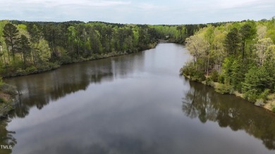 This stunning Braxton floorplan--one of the most sought-after on Hasentree Club in North Carolina - for sale on GolfHomes.com, golf home, golf lot