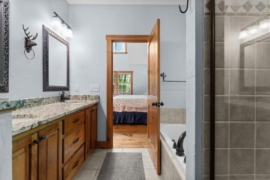 Located in Sapphire Valley, this 3-bedroom, 2.5-bathroom cabin on Sapphire National Golf Club in North Carolina - for sale on GolfHomes.com, golf home, golf lot