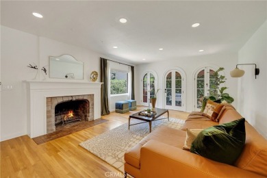 Welcome to 440 W San Antonio Drive, a timeless Spanish-style gem on Virginia Country Club in California - for sale on GolfHomes.com, golf home, golf lot