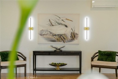 Welcome to 440 W San Antonio Drive, a timeless Spanish-style gem on Virginia Country Club in California - for sale on GolfHomes.com, golf home, golf lot