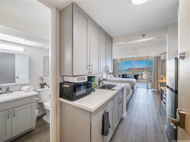 Live where the world vacations at Island Colony in the heart of on Ala Wai Golf Course in Hawaii - for sale on GolfHomes.com, golf home, golf lot