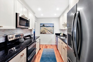 57 Beach Club Villa offers refined oceanfront living in the on Wild Dunes Harbor Golf Resort in South Carolina - for sale on GolfHomes.com, golf home, golf lot