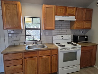 2 FURNISHED HOMES FOR THE PRICE OF 1! Fantastic investment on Rockport Country Club in Texas - for sale on GolfHomes.com, golf home, golf lot