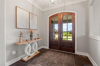 Nestled on a breathtaking 0.43-acre estate lot in the on Champions Pointe Golf Course in Indiana - for sale on GolfHomes.com, golf home, golf lot