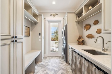 Tucked away on a quiet cul-de-sac, surrounded by magnolias and on Santa Rosa Golf and Beach Club in Florida - for sale on GolfHomes.com, golf home, golf lot