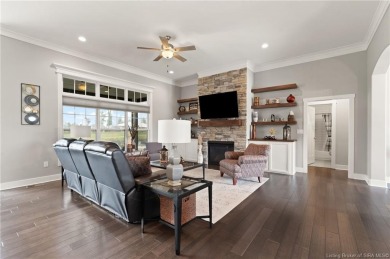 Nestled on a breathtaking 0.43-acre estate lot in the on Champions Pointe Golf Course in Indiana - for sale on GolfHomes.com, golf home, golf lot