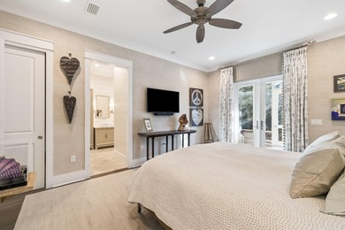 Tucked away on a quiet cul-de-sac, surrounded by magnolias and on Santa Rosa Golf and Beach Club in Florida - for sale on GolfHomes.com, golf home, golf lot