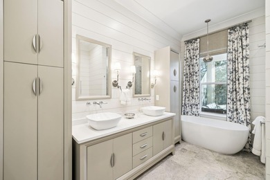 Tucked away on a quiet cul-de-sac, surrounded by magnolias and on Santa Rosa Golf and Beach Club in Florida - for sale on GolfHomes.com, golf home, golf lot