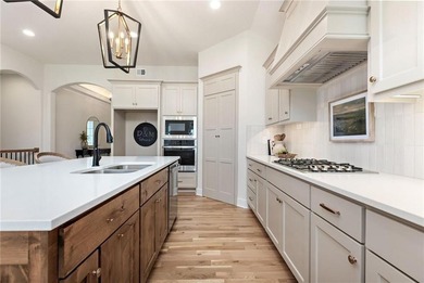 This thoughtfully designed home offers comfortable main-level on Heritage Park Golf Course in Kansas - for sale on GolfHomes.com, golf home, golf lot