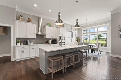 Nestled on a breathtaking 0.43-acre estate lot in the on Champions Pointe Golf Course in Indiana - for sale on GolfHomes.com, golf home, golf lot