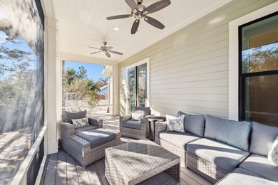 Tucked away on a quiet cul-de-sac, surrounded by magnolias and on Santa Rosa Golf and Beach Club in Florida - for sale on GolfHomes.com, golf home, golf lot