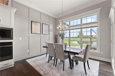 Nestled on a breathtaking 0.43-acre estate lot in the on Champions Pointe Golf Course in Indiana - for sale on GolfHomes.com, golf home, golf lot