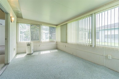 A completely updated 1,124 square foot two-bedroom, two bath on Tampa Bay Golf and Country Club in Florida - for sale on GolfHomes.com, golf home, golf lot