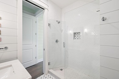 Tucked away on a quiet cul-de-sac, surrounded by magnolias and on Santa Rosa Golf and Beach Club in Florida - for sale on GolfHomes.com, golf home, golf lot