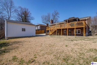 This well-maintained four-bedroom, two-bathroom home is located on Charlie Vettiner Golf Course in Kentucky - for sale on GolfHomes.com, golf home, golf lot